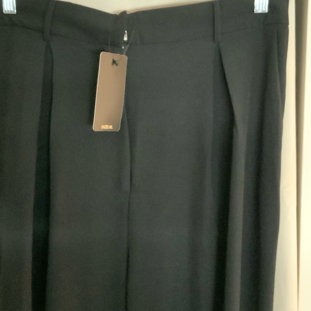 Black pants with ankle tie